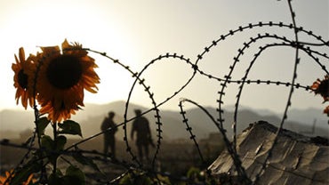 Members of the 3rd Platoon, Able Company 3-509th Infantry Regiment (Airborne), 4th BDE -25th Infantry Division from Fort Richardson, Alaska, patrol area around COP Zerok damaged during the Taliban assault on July 4th in Zerok District, East Paktika provin 