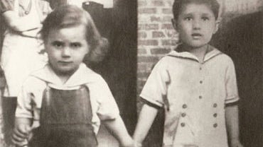 John Gotti was born Oct. 27, 1940. He had grown up one of 11 children -- raised in Brooklyn by an abusive father and an overwhelmed mother. Here, young John, left, walks hand-in-hand with his brother, Peter, as their mother, Fannie, looks on 