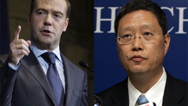 Russian President Dmitry Medvedev (left) speaking to university students in Pittsburgh, Sept. 24, 2009; Chinese Vice Foreign Minister He Yafei in a July 2009 file photo in Rome. 