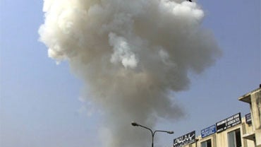 Smoke blow up after a bomb explosion in a commercial district in Peshawar, Pakistan on Saturday, Sept. 26, 2009. 