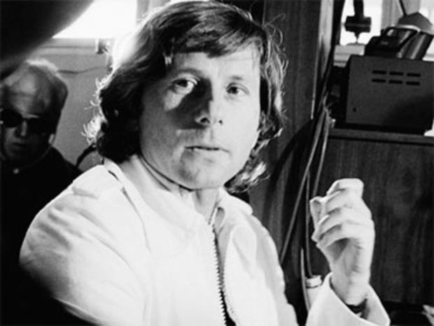 File - Movie director Roman Polanski talks with correctional officers in this Dec. 17, 1977 file photo taken at Chino Mens Institute in Chino, Calif. Polanski, who pleaded guilty to having sex with a 13-year-old girl was beginning a court ordered 90-day p 