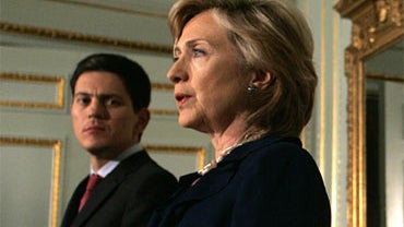 U.S. Secretary of State Hillary Rodham Clinton, right, speaks as Britain's Foreign Secretary David Miliband looks on during a press conference after their meeting at 1 Carlton Gardens in London, Sunday, Oct. 11, 2009. 
