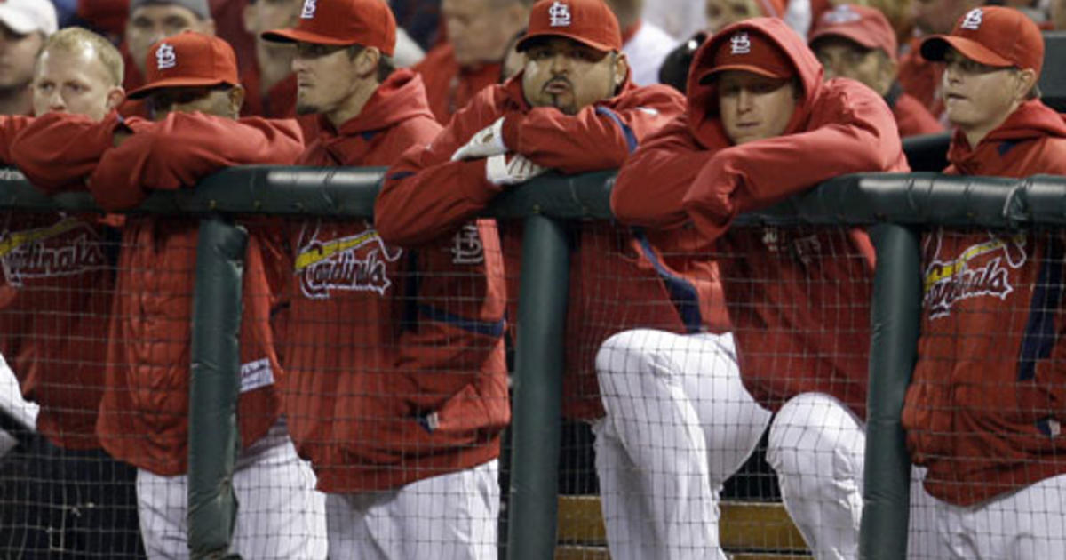 Pitcher Pedro Martinez (L) and catcher Carlos Ruiz walk towards the  Philadelphia Phillies' dugout before their game against the New York  Yankees during game two of the World Series at Yankee Stadium