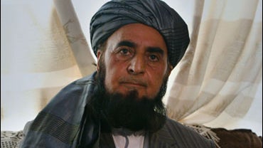 Maulavi Mustafa Barakzai a member of the Electoral Complaints Commission of Afghanistan Independent Election Commission listens to a question during announcing his resignation at a press conference in Kabul, Afghanistan, Monday, Oct. 12, 2009. One of the  