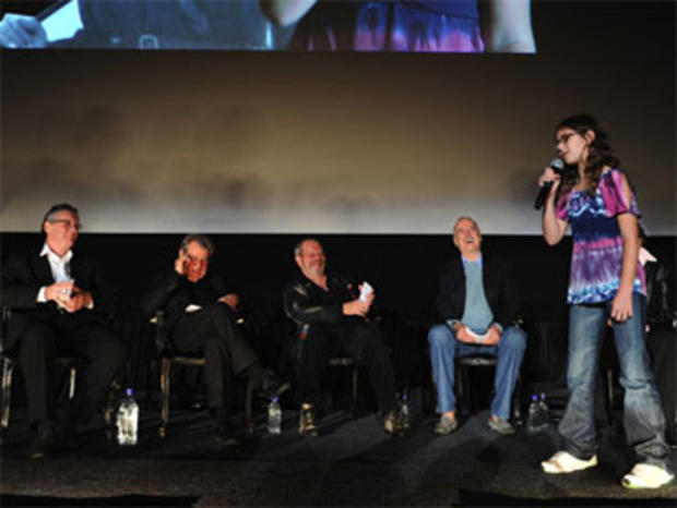 Michael Palin, Terry Jones, Terry Gilliam, John Cleese and Eric Idle with 10-year-old Talia Lindner who performed the Monty Python "Spanish Inquisition" sketch on stage during the Q&A portion of the Monty Python 40th anniversary reunion, at New York's Zie 