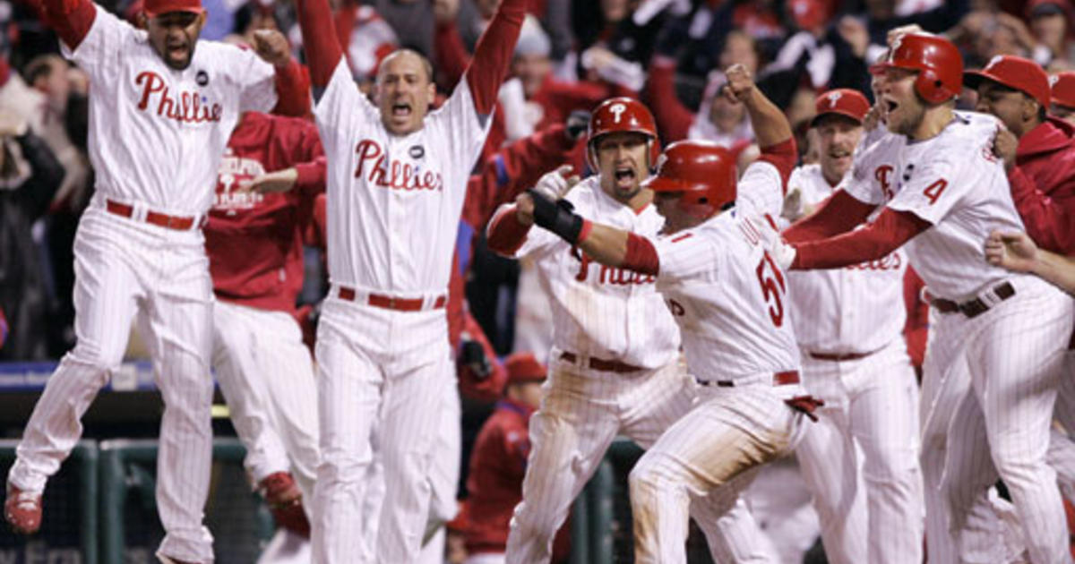 Philadelphia Phillies' Brad Lidge, right, and Carlos Ruiz celebrate after  winning Game 5 of the National League Championship baseball series against  the Los Angeles Dodgers Wednesday, Oct. 21, 2009, in Philadelphia. The