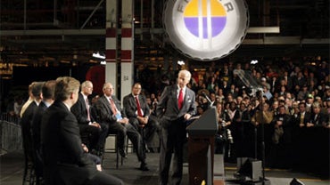 Vice President Joe Biden, center, speaks about the announcement that Fisker Automotive will produce plug-in hybrid electric vehicles at the former General Motors Boxwood Plant, Tuesday, Oct. 27, 2009, in Wilmington, Del. 