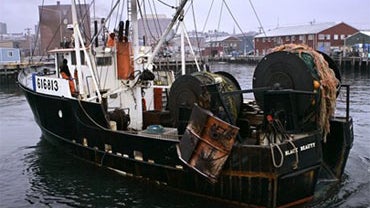 FILE - In this Jan 2007 file photo, the trawler Black Beauty leaves the Portland Fish Exchange, in Portland, Maine. A study by the National Oceanic and Atmospheric Administration says rising water temperatures are helping drive many of New England's fish  