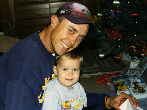 Mike and Mikey celebrate Mikey's third Christmas in 2002. 