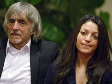 Sister of slain British student Meredith Kercher, Stephanie, right, shares a word with her father John. The parents and sister of Meredith Kercher, slain last year in Perugia, have read a statement to the press on Monday, on the eve of a closed-door preli 