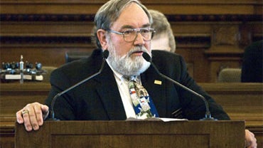 State Rep. Bill Otto, R-Leroy, speaks on the house floor in support of a conference committee report concerning the construction of two new coal fired plants in Topeka, Kan., Wednesday, May, 7, 2008. (AP Photo/Chuck France) 