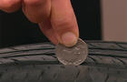 Early Show consumer correspondent Susan Koeppen demonstrated that if you can see the top of Washington's head on a quarter when you insert it into your tire's tread, it may be time to get new tires. 
