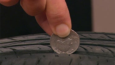 Early Show consumer correspondent Susan Koeppen demonstrated that if you can see the top of Washington's head on a quarter when you insert it into your tire's tread, it may be time to get new tires. 