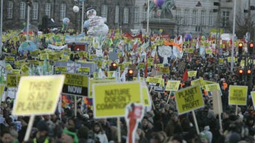 Some of the thousands of people demonstrating on the the street in central Copenhagen, Denmark, Saturday, Dec. 12, 2009. 