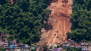 A mountainside is bare after a mudslide in Morro da Carioca, an area in the city of Angra dos Reis, near Rio de Janeiro, Brazil, Saturday, Jan. 2, 2010. 