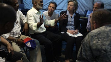 U.S. Secretary of State Hillary Clinton, third from right, meets with Haiti's President Rene Preval, third from left, to discuss conditions in the country following Tuesday's deadly earthquake in Port-au-Prince, Haiti, Saturday, Jan. 16, 2010. 