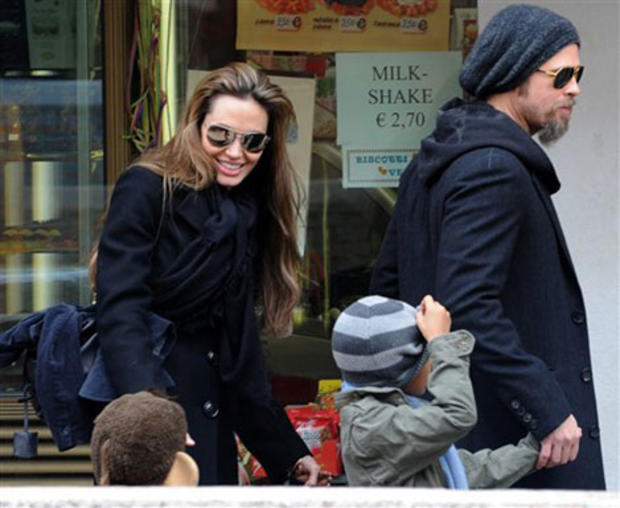 Actors Angelina Jolie, left, and Brad Pitt, second left, are seen with children Maddox, left, Shiloh Nouvel, in Venice, Tuesday, Feb. 16, 2010.  (AP Photo/Luigi Costantini) 