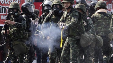 Thai soldiers battle anti-government demonstrators Saturday, April 10, 2010, in Bangkok, Thailand. 
