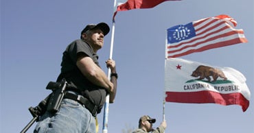 Protesters Bear Rifles, Handguns at Va. Rally - CBS News