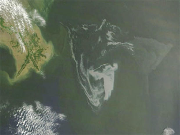 In this May 1, 2010 satellite photo provided by NASA, the oil slick in the Gulf of Mexico closes in on the Gulf Coast in the southern United States. 
