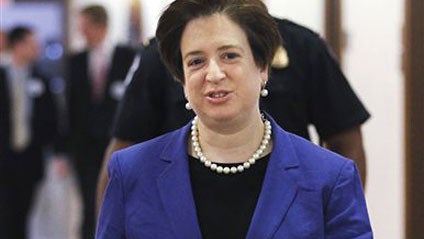 Supreme Court nominee Elena Kagan walks on Capitol Hill in Washington in this photo taken May 20, 2010. Kagan, a Supreme Court nominee without judicial experience, has suggested in writings and speeches over a quarter-century that when judges make decisio 