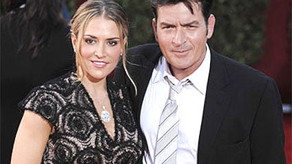 In this Sunday, Sept. 20, 2009, picture, actor Charlie Sheen, right, and wife Brooke Mueller arrive at the 61st Primetime Emmy Awards in Los Angeles. A woman who identified herself as the wife of Charlie Sheen said in a 911 call to Aspen police that the a 