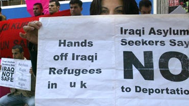 Protesters demonstrate against the deportation of Iraqi asylum-seekers in Britain, outside the Home Office in London, Aug, 26, 2005. 