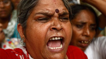 Victims of the Bhopal gas disaster shout slogans against the Indian government at a rally in New Delhi, India, Thursday, June 24, 2010. Anger over the world's worst industrial disaster, at a plant owned by a Union Carbide subsidiary in the central Indian  