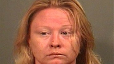 This June 23, 2010 booking photo provided by the Vigo County Sheriff's Department shows Stephanie Foster, 34. Police say foster forced her way into a western Indiana home at gunpoint and then stabbed a husband and wife in an apparent attempt to kidnap the 