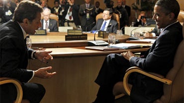 President Barack Obama of the United States speaks with President Nicolas Sarkozy of France, left, as they attend a leaders working session at the G8 Summit at Deerhurst Resort in Huntsville, Ontario, Saturday, June 26, 2010.  