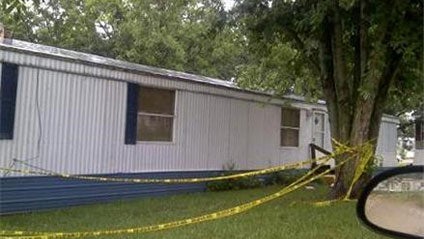 Outside of home where 12-year-old is accused of murdering his parents (KRCG) 