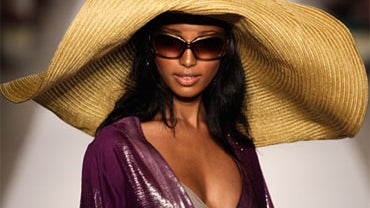 A model walks down the runway during the Trina Turk Swim & Spa 2011 show at the Mercedes- Benz Fashion Week Swim in Miami Beach, Fla., Thursday, July 15, 2010. 