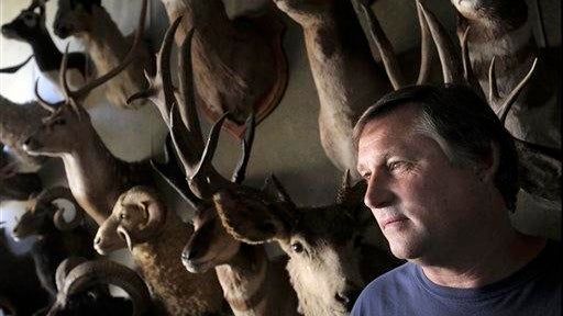 Gary Robbins Pets Trigger's Taxidermist 