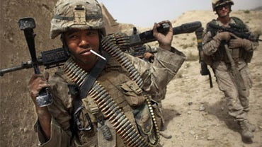 United States Marine LCpl. Brian Quinnones from Bravo Company of the 1st Battalion of the 2nd Marines has an unlit cigarette in his mouth following a gun battle as part of an operation to clear the area of insurgents near Musa Qaleh, in northern Helmand P 