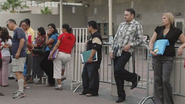 People wait at the U.S. consulate in Ciudad Juarez, Mexico, Friday July 30, 2010. 
