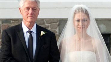 Former President Bill Clinton walks his daughter Chelsea Clinton down the aisle. Chelsea Clinton was married to Marc Mezvinsky at Astor Court in Rhinebeck, NY on July 31, 2010. 