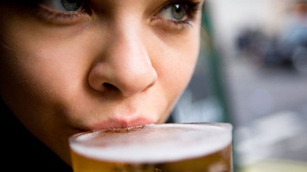 woman drinking beer, generic, stock 