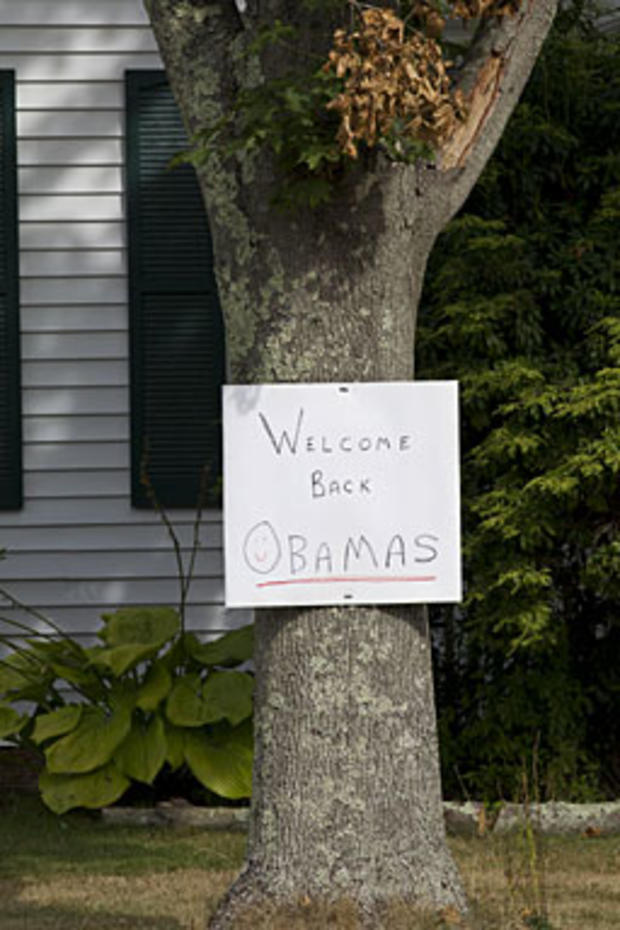 A sign welcoming President Barack Obama back to Martha's Vineyard is displayed on a tree in the front yard of a home Aug. 21, 2010, in West Tisbury, Mass. 