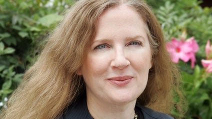 this publicity image released by Scholastic, author Suzanne Collins is shown in New York on Aug. 12, 2009. (AP Photo/Scholastic, Todd Plitt) 