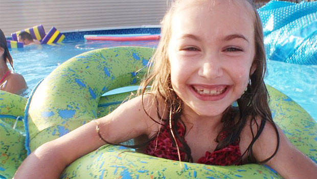 Kathleen Edward, 7, is dying from Huntington's disease and also enduring cyberbullying. 