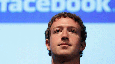 Facebook founder Mark Zuckerberg speaks in the Galileo Auditorium on Microsoft?s Silicon Valley Campus in Mountain View, Wednesday, Oct. 13, 2010. (AP Photo/Jeff Chiu) 