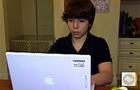 Blake Robbins on his laptop. 