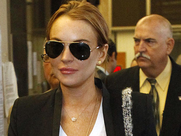 Lindsay Lohan leaves the Beverly Hills courthouse after attending a probation violation hearing for failing a drug test on Oct. 22, 2010, in Beverly Hills, Calif.  