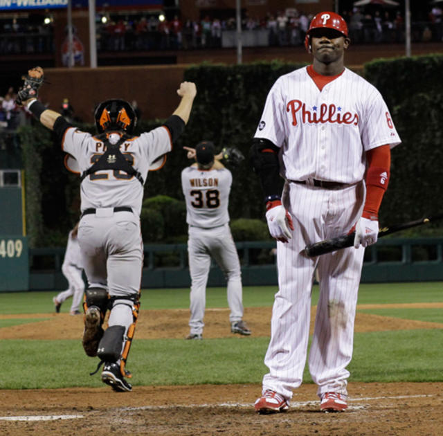 Texas Rangers' Josh Hamilton is congratulated by teammate Vladimir Guerrero  after hitting a solo homerun during the 5th inning against the San  Francisco Giants in game 3 of the World Series at