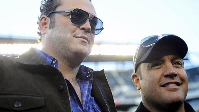 Actors Vince Vaughn, left, and Kevin James walk the sidelines during warmups before an NFL football game between the Philadelphia Eagles and the Indianapolis Colts, Sunday, Nov. 7, 2010 in Philadelphia. (AP Photo/Michael Perez) 