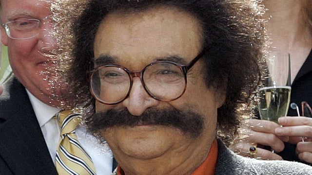 FILE - In this May 31, 2006 file photo, film critic Gene Shalit is seen during a toast with "Today" show cast and crew at the end of Katie Couric's final show, in New York. Shalit, 84, said Tuesday, Nov. 9, 2010 that he's leaving the "Today" show, where h 