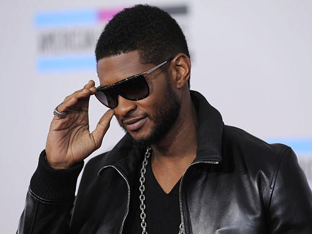 Usher arrives at the 38th Annual American Music Awards on Sunday, Nov. 21, 2010 in Los Angeles. (AP Photo/Chris Pizzello) 