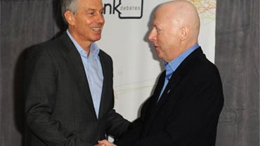 Tony Blair and Christopher Hitchens before a Munk debate on whether relgiion is a force of global good, in Toronto, Nov. 26, 2010.  