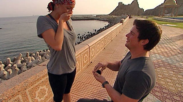 Chad  Waltrip proposes to Stephanie Smith in Oman on the Nov. 14  episode of "The Amazing Race." (CBS Photo) 