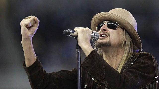 Musician Kid Rock performs during the half time ceremony at the NFL football game between thd Detroit Lions and the New England Patriots, Thursday, Nov. 25, 2010, at Ford Field in Detroit. (AP Photo/Carlos Osorio) 